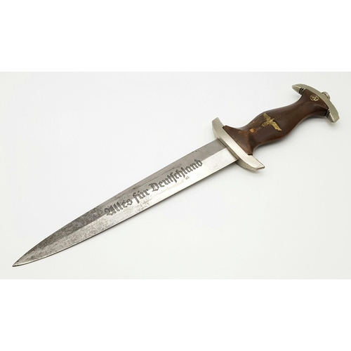 559 - A 3rd Reich SA Dagger. Rzm Marked M7/2 for the manufacturer Emil Voos Waffen Fabrik Solingen. A slig... 