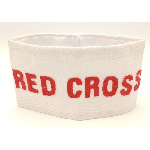 1149 - A WW2 British Home Front Red Cross Helpers Arm Band. Worn by non-medical volunteers assisting the Re... 