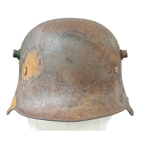 167 - A WW1 Imperial German M17 Jigsaw pattern camouflage Stahlhelm with liner.