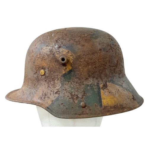 167 - A WW1 Imperial German M17 Jigsaw pattern camouflage Stahlhelm with liner.