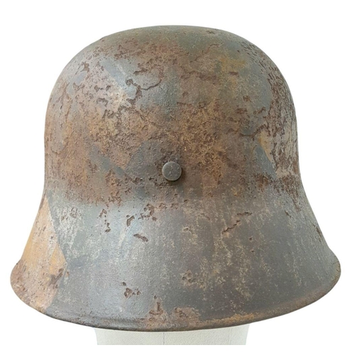 167 - A WW1 Imperial German M17 Jigsaw pattern camouflage Stahlhelm with liner.