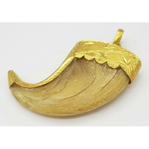 232 - Withdrawn - An Antique 22k Gold (tested) Tigers Claw Pendant. 17g total weight. 6cm x 4cm.