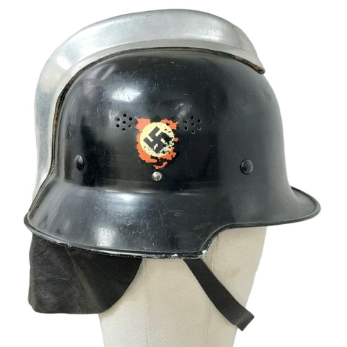 279 - A WW2 German “Feuerwehr” Firefighters Helmet. Complete with decals, chin strap and nape protector.