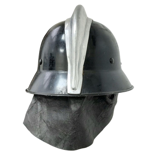 279 - A WW2 German “Feuerwehr” Firefighters Helmet. Complete with decals, chin strap and nape protector.