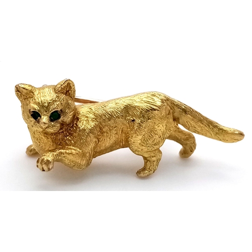 309 - A 9K Yellow Gold Pussy Cat Brooch with Green Eyes. 2.5cm. 
8.35g weight.