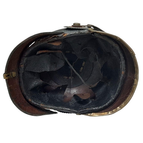 41 - A WW1 Imperial German Model 1895 Enlisted Mans/Nco’s Pickelhaube. Dated 1896 with markings to the 69... 