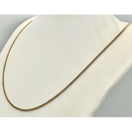 414 - A 9K Yellow Gold Petit Curb Link Necklace. 44cm. 3.85g weight.