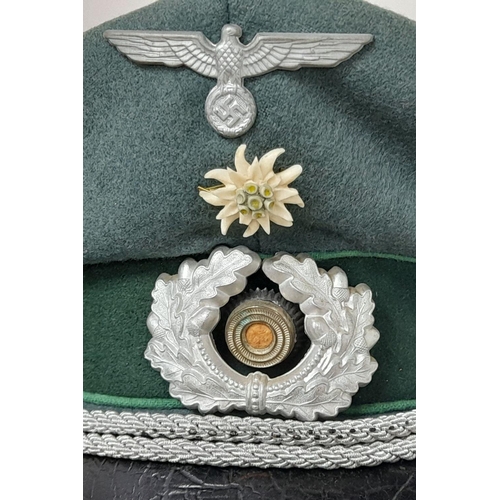 61 - A WW2 German Gebirgsjäger Officers Visor Cap.