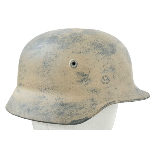 96 - A WW2 German M40 single decal Luftwaffe Africa Corps Helmet. Wirh liner.