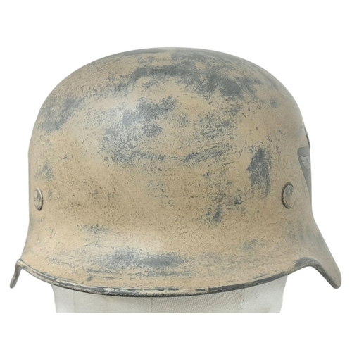 96 - A WW2 German M40 single decal Luftwaffe Africa Corps Helmet. Wirh liner.