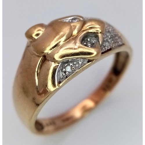 297 - A Vintage Hallmarked 9 Carat Gold and Diamond Set Panther Detailed Ring Size V. The Ring Measures 1.... 