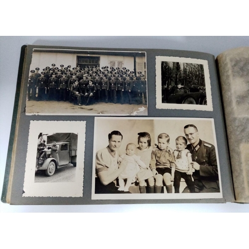 384 - A WW2 German Photo Album from a soldier in the 2nd Battery Artillery. A good selection of photos inc... 