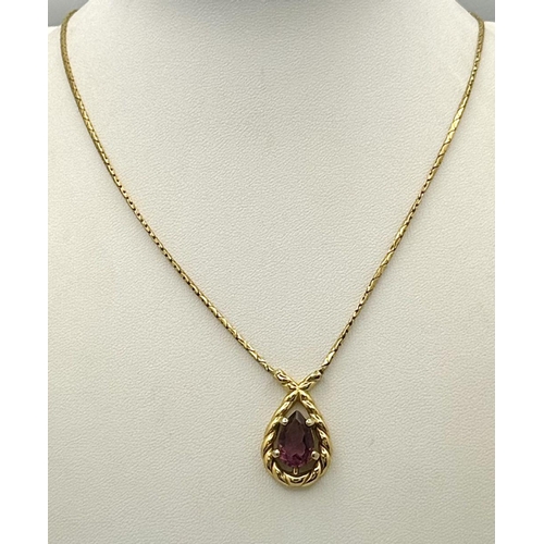 550 - A Vintage Gold Tone Amethyst Set Necklace by Christian Dior. 48cm Length. Pendant Drop is 2.5cm and ... 