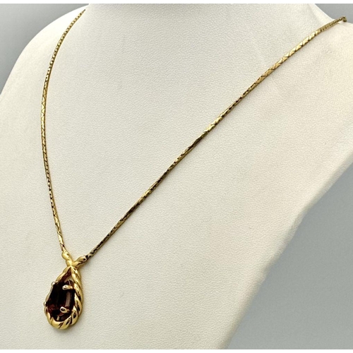 550 - A Vintage Gold Tone Amethyst Set Necklace by Christian Dior. 48cm Length. Pendant Drop is 2.5cm and ... 