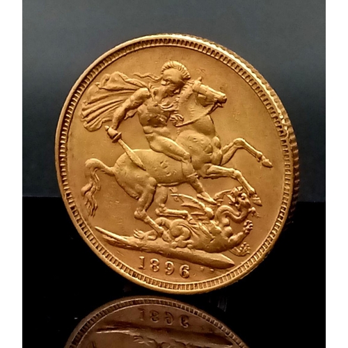 9 - A 22K GOLD SOVEREIGN DATED 1896 AND IN A PROTECTIVE CAPSULE.