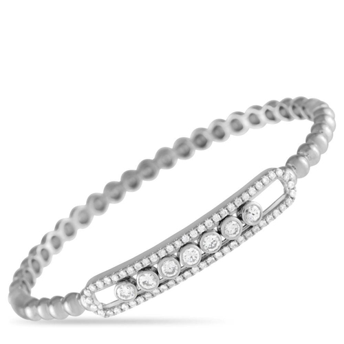 114 - An 18K White Gold 1.20ct Diamond Bracelet. Elevated by 1.20 carats of sparkling diamonds, it measure... 