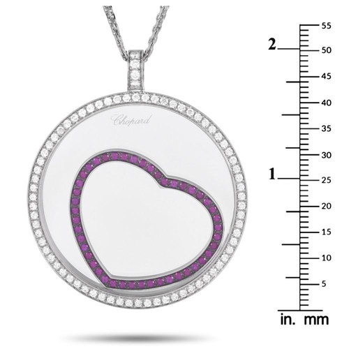 135 - A Chopard Happy Diamonds 18K White Gold 1.31ct Diamond and Ruby Necklace. Suspended from a 23 chain,... 