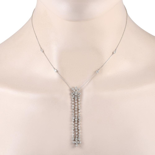 254 - A 14K White Gold 2.0ct Diamond Necklace. 14K white gold chain with four pear-shaped clusters of bagu... 