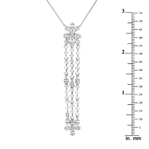 254 - A 14K White Gold 2.0ct Diamond Necklace. 14K white gold chain with four pear-shaped clusters of bagu... 