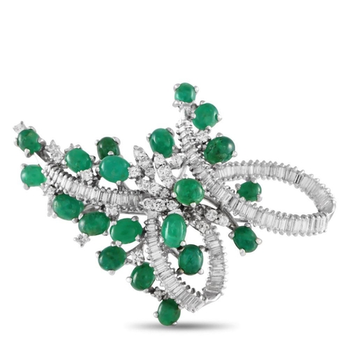 268 - A 14K White Gold 3.60ct Diamond and Emerald Brooch. Diamond baguettes and round-cut diamonds with a ... 