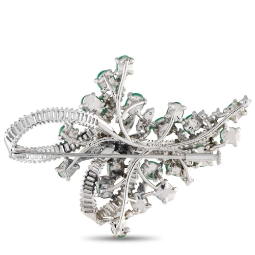 268 - A 14K White Gold 3.60ct Diamond and Emerald Brooch. Diamond baguettes and round-cut diamonds with a ... 