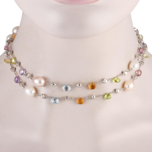 339 - A Marco Bicego 18K White Gold Multi Gem Necklace. Multi-colored gems alternating with textured and c... 