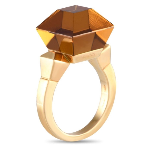 508 - A Gucci Chiodo 18K Yellow Gold Citrine Ring. 18K yellow gold angular band with oversized step-cut ci... 