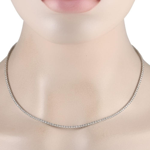 577 - A 14K White Gold 6.01ct Lab-Grown Diamond Tennis Necklace. Features a graceful line of 6.01-carats r... 