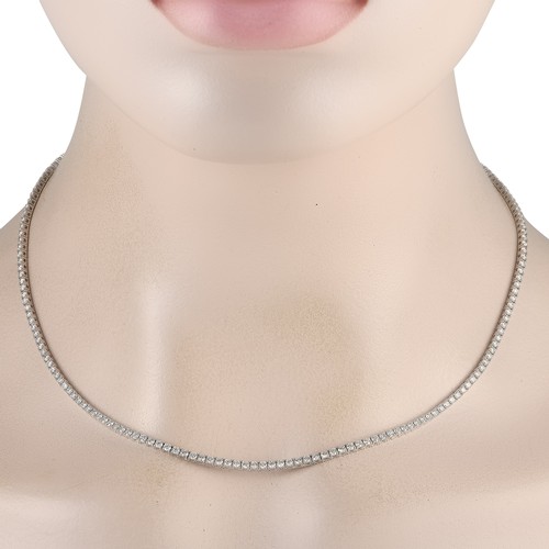 107 - A sparkling 14K White Gold 6.01ct Lab-Grown Diamond Tennis Necklace. Features a graceful line of 6.0... 