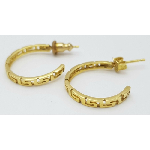 240 - A PAIR OF 14K GOD EARRINGS WITH GREEK STYLE PATTERN .    3.5gms