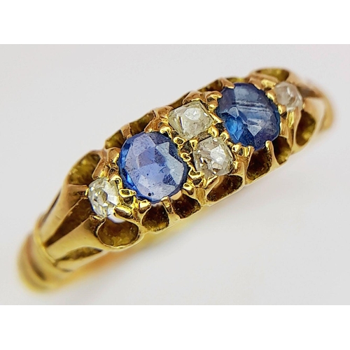 489 - A VINTAGE 18K GOLD SAPPHIRE AND DIAMOND RING .    2.7gms     size L