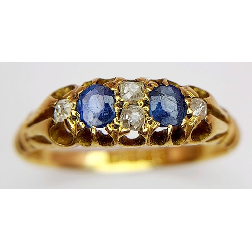 489 - A VINTAGE 18K GOLD SAPPHIRE AND DIAMOND RING .    2.7gms     size L