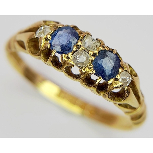 489 - A VINTAGE 18K GOLD SAPPHIRE AND DIAMOND RING .    2.7gms     size L