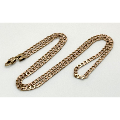 576 - A 9K Yellow Gold Flat Curb Link Chain. 50cm. 7.8g weight.