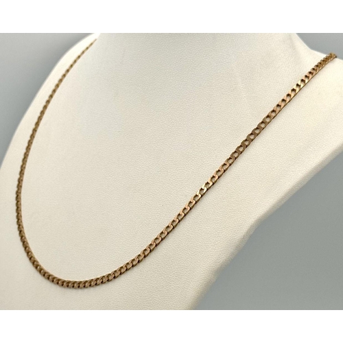 576 - A 9K Yellow Gold Flat Curb Link Chain. 50cm. 7.8g weight.