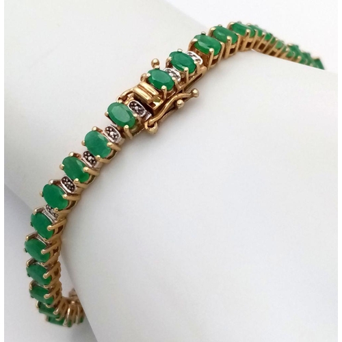 578 - A Yellow Gold Gilt Sterling Silver Emerald Set Tennis Bracelet-21cm Length. Set with Forty 5mm Long ... 