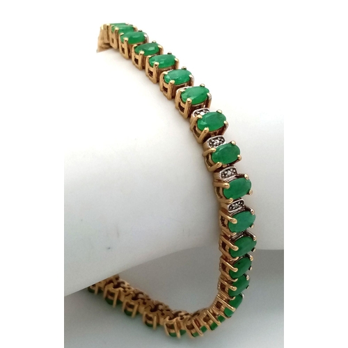 578 - A Yellow Gold Gilt Sterling Silver Emerald Set Tennis Bracelet-21cm Length. Set with Forty 5mm Long ... 