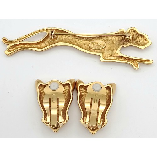 86 - A rare, vintage, original JOAN COLLINS PANTHER brooch and matching earrings set in original presenta... 