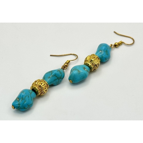 283 - A Chinese turquoise coloured necklace and earrings set with gold plated “pixious” and “good luck” be... 