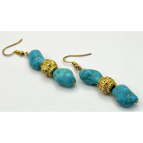 283 - A Chinese turquoise coloured necklace and earrings set with gold plated “pixious” and “good luck” be... 