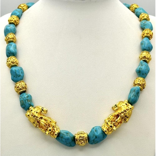 283 - A Chinese turquoise coloured necklace and earrings set with gold plated “pixious” and “good luck” be... 