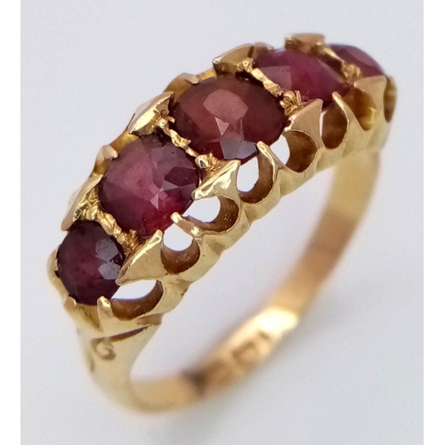 31 - An Antique 18K Yellow Gold Five Stone Ruby Ring. 1.2ctw of rubies. Size L. 3.6g total weight. Birmin... 