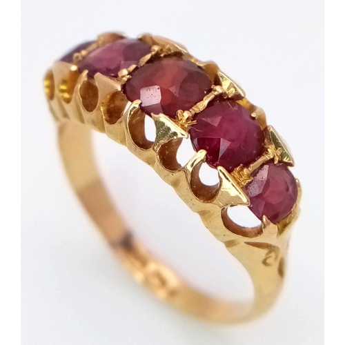 31 - An Antique 18K Yellow Gold Five Stone Ruby Ring. 1.2ctw of rubies. Size L. 3.6g total weight. Birmin... 