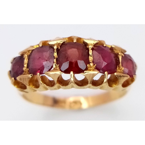 31 - An Antique 18K Yellow Gold Five Stone Ruby Ring. 1.2ctw of rubies. Size L. 3.6g total weight. Birmin... 