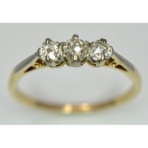 486 - AN 18K YELLOW GOLD OLD CUT DIAMOND THREE STONE RING - 0.30CTW. 2.3G. SIZE Q. TAN6016