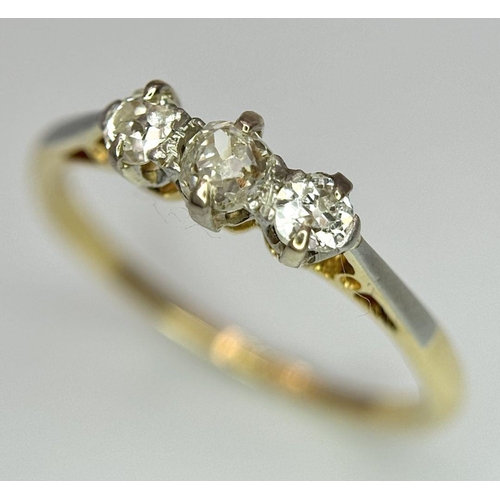 486 - AN 18K YELLOW GOLD OLD CUT DIAMOND THREE STONE RING - 0.30CTW. 2.3G. SIZE Q. TAN6016