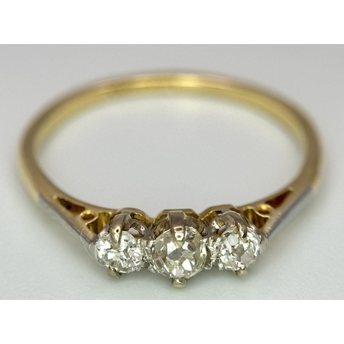 486 - AN 18K YELLOW GOLD OLD CUT DIAMOND THREE STONE RING - 0.30CTW. 2.3G. SIZE Q. TAN6016