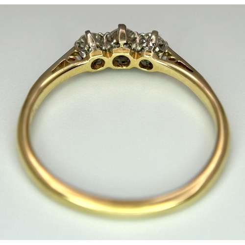 486 - AN 18K YELLOW GOLD OLD CUT DIAMOND THREE STONE RING - 0.30CTW. 2.3G. SIZE Q. TAN6016