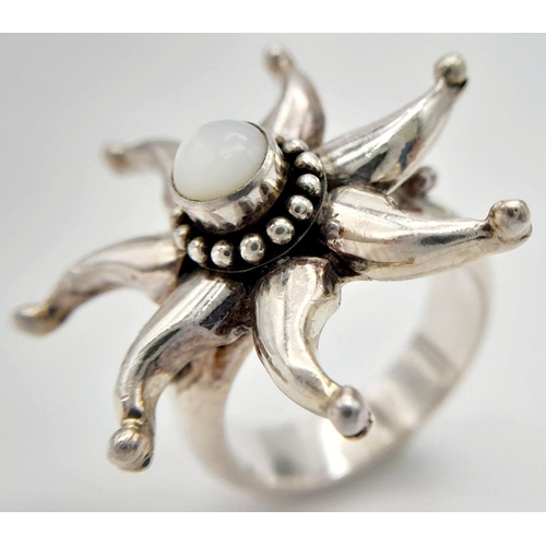 606 - A Heavy ‘Suarti’ Sterling Silver Moonstone Set Ring Size U. The Ring Measures 3cm Wide at the Crown ... 