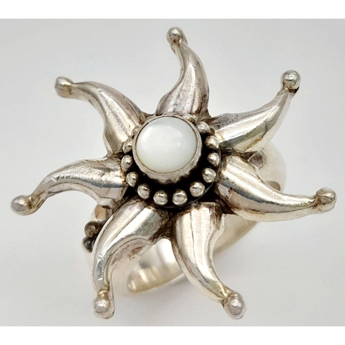 606 - A Heavy ‘Suarti’ Sterling Silver Moonstone Set Ring Size U. The Ring Measures 3cm Wide at the Crown ... 